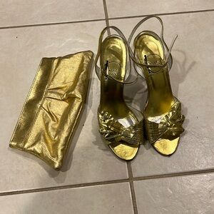 Gold Ankle strap shoes and Laura Merkin clutch.